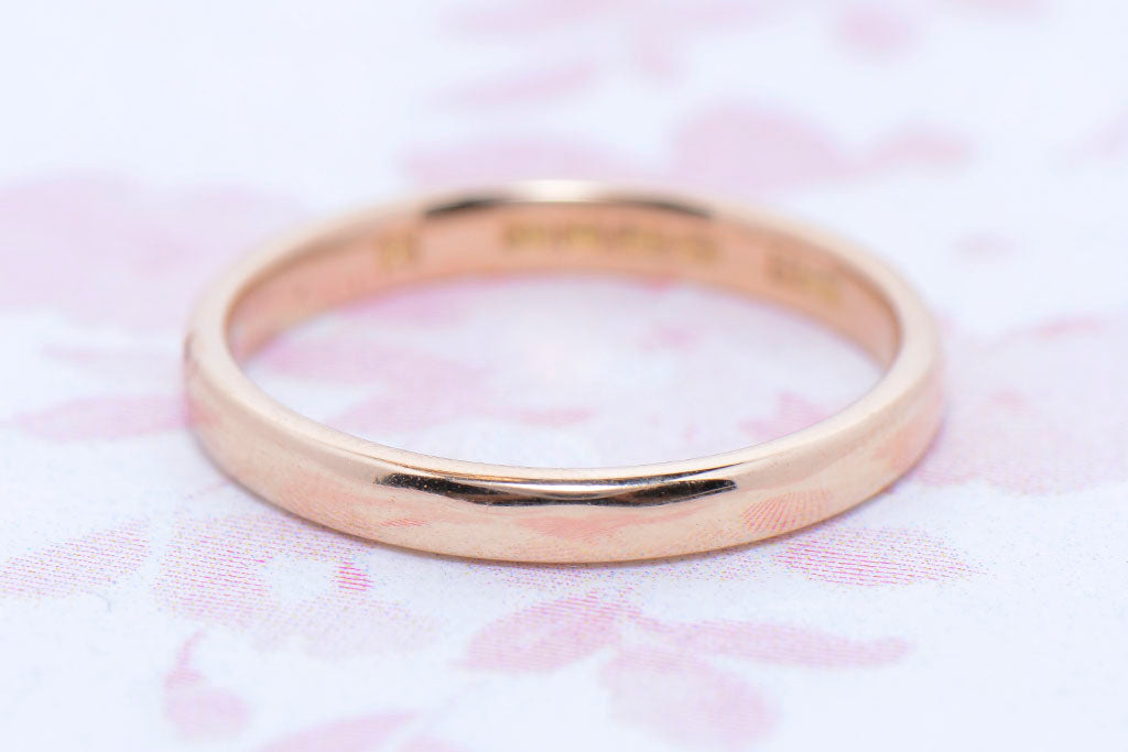 A Twentieth Century 18ct Gold wedding band