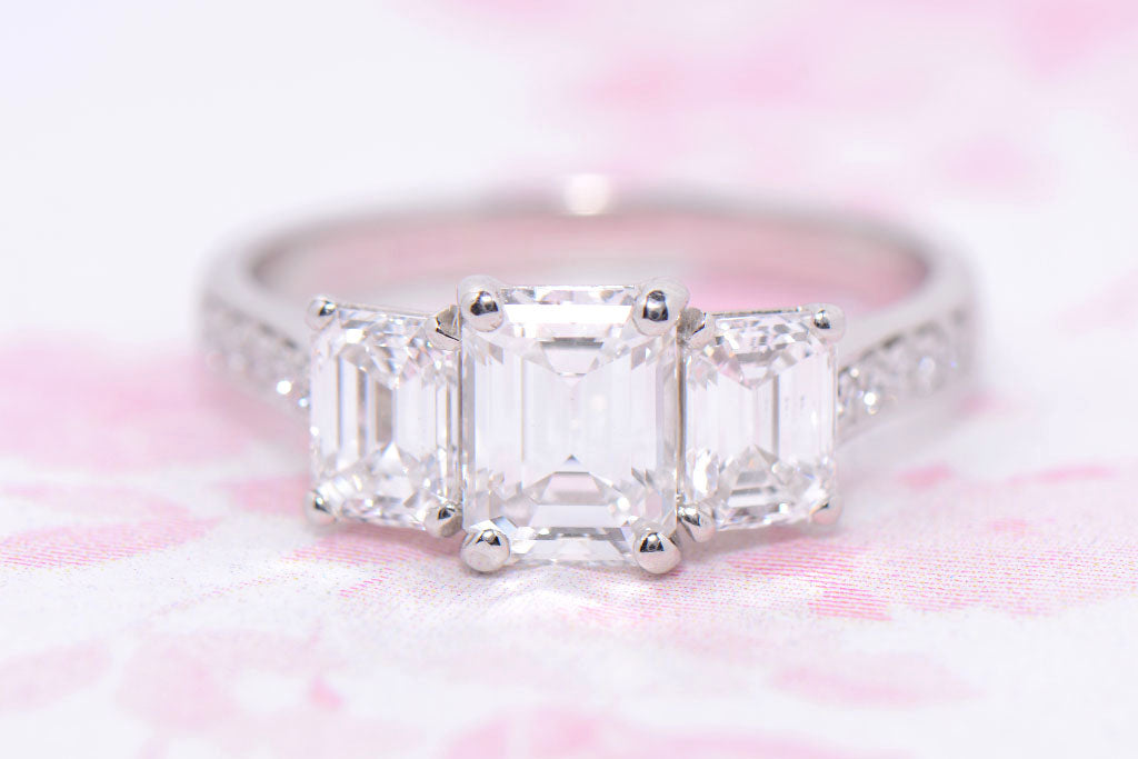 GIA Platinum and Emerald Cut Diamond Trilogy ring