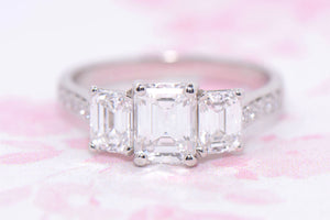 GIA Platinum and Emerald Cut Diamond Trilogy ring