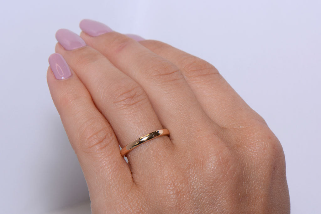 A Twentieth Century 18ct Gold wedding band