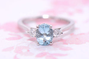 Platinum Diamond and Aquamarine Trilogy ring