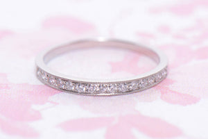 Platinum Grain Set Diamond half hoop ring