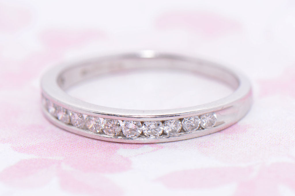 Platinum and Diamond half hoop ring