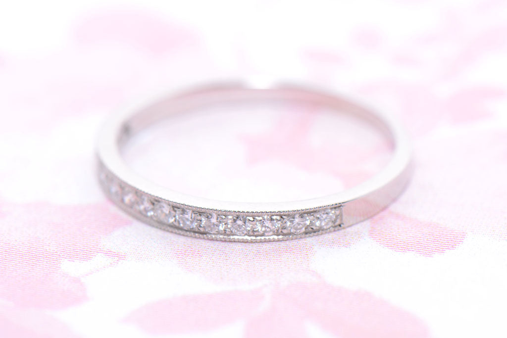 Platinum Grain Set Diamond half hoop ring