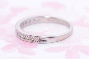 Platinum and Diamond half hoop ring