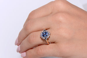 Cornflower blue Sapphire and Diamond cluster ring