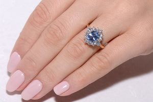 Cornflower blue Sapphire and Diamond cluster ring