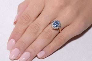 Cornflower blue Sapphire and Diamond cluster ring