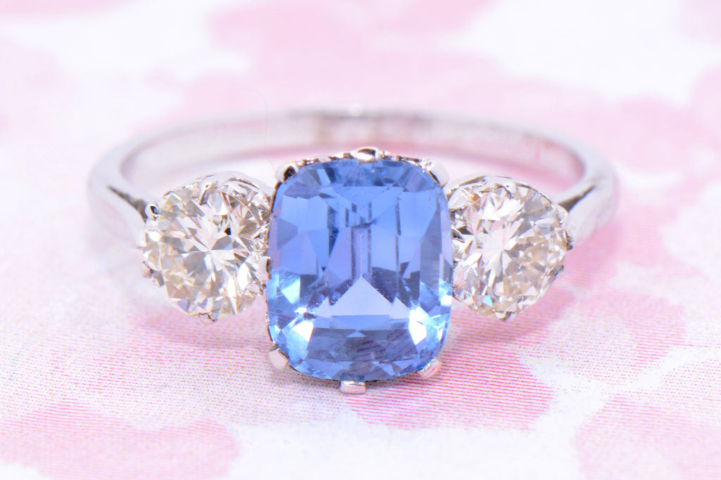 A certificated Mid Twentieth Century Sapphire and Diamond Trilogy ring