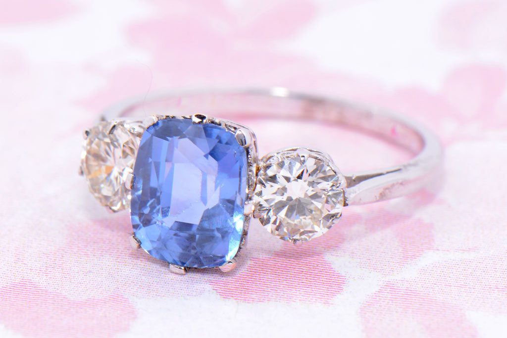 A certificated Mid Twentieth Century Sapphire and Diamond Trilogy ring