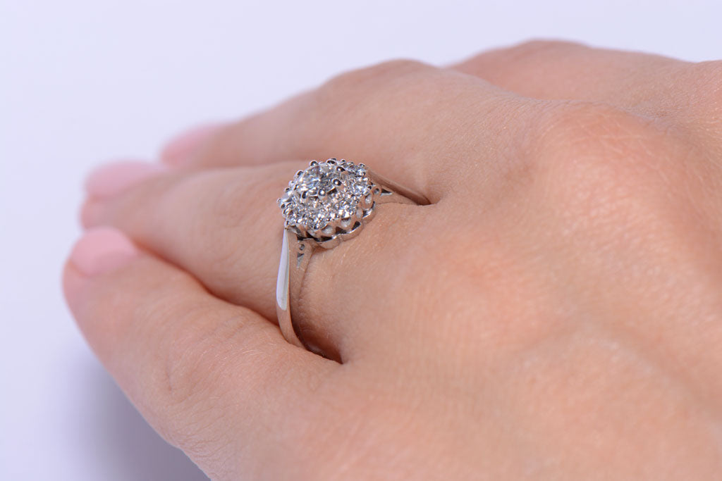 Diamond flower head cluster ring