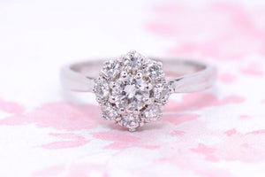 Diamond flower head cluster ring