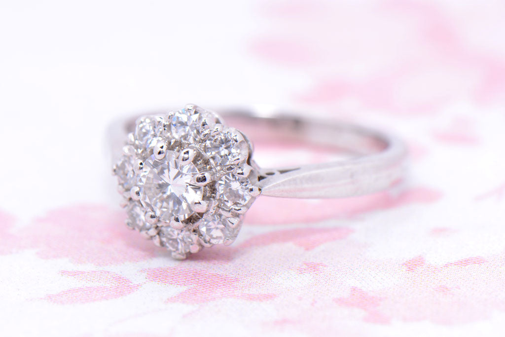 Diamond flower head cluster ring